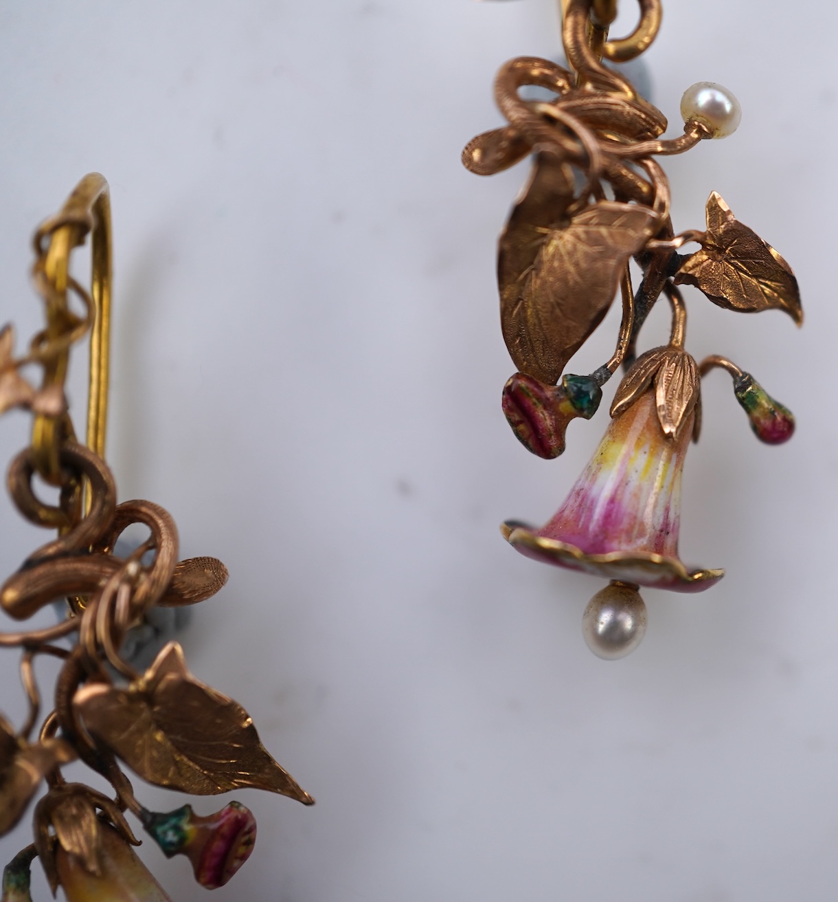 A rare pair of naturalistic gold, enamel and seed pearl earrings, circa 1850